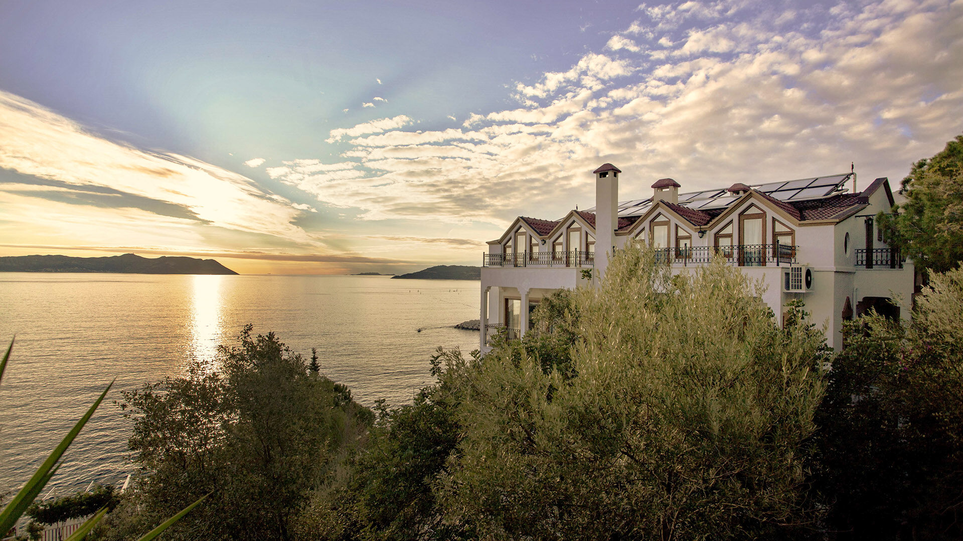 Medusa Hotel and the bay at sunset, seen from the hillside, Kaş