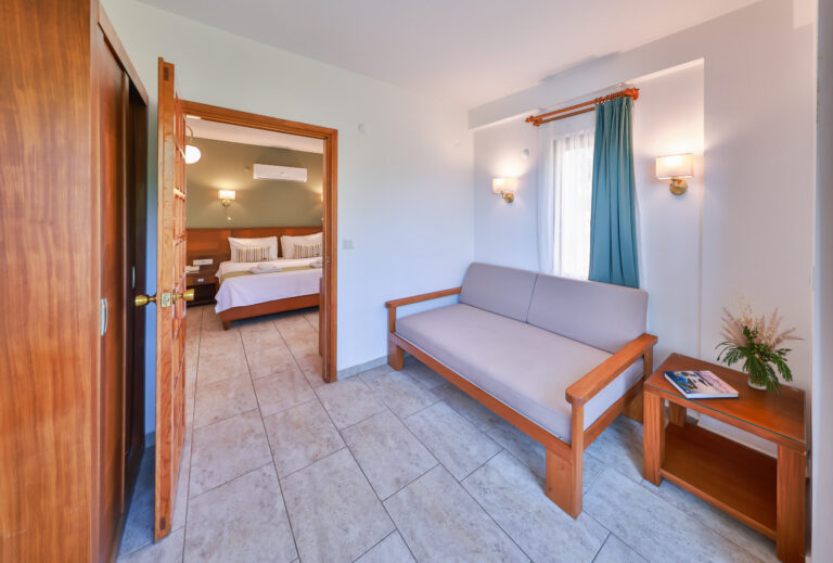 Family Suite with the communicating door open between the bedroom and the sitting room, Medusa Hotel Kaş