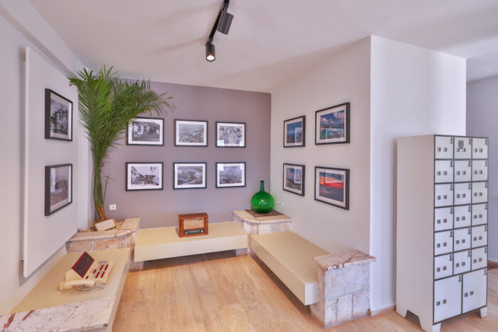 Lounge corner with framed photographs of Kaş and stone seating, Medusa Hotel Kaş