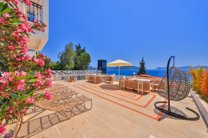 Sea-facing terrace with oleanders and a hanging chair, Medusa Hotel Kaş