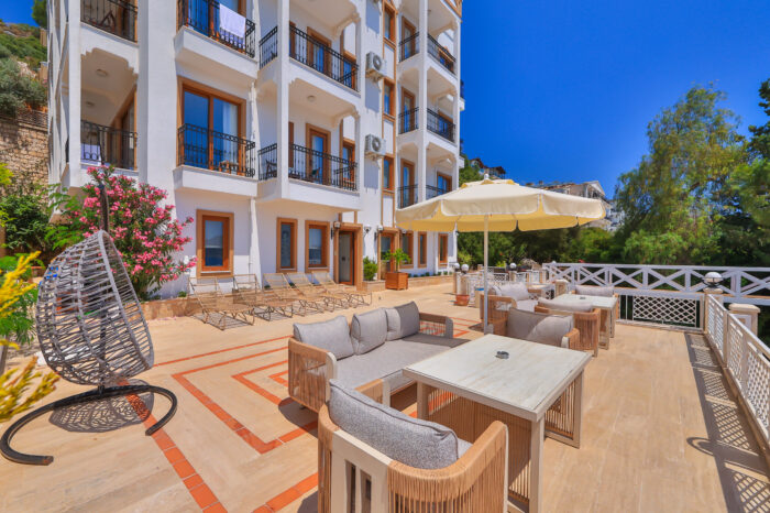 Terrace lounge seating below the balconies, Medusa Hotel Kaş